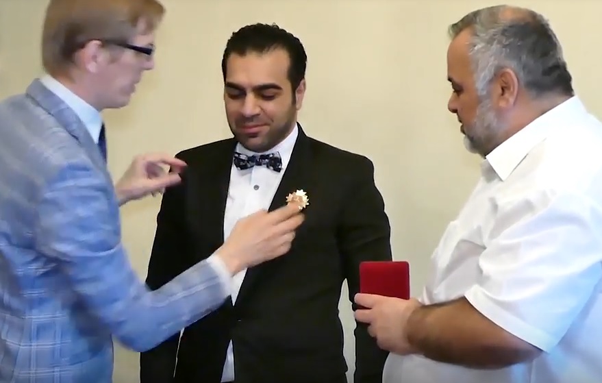 Anas Bao receives his medal in Moscow