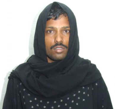 Photo circulated by police of an Indian man arrested for cross-dressing in Sharjah last month