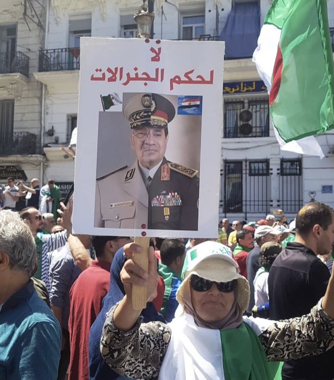 Friday's protest. Placard says "No to rule by the generals". Photo: <a href="https://twitter.com/raoufbeingmoor">@raoufbeingmoor</a>