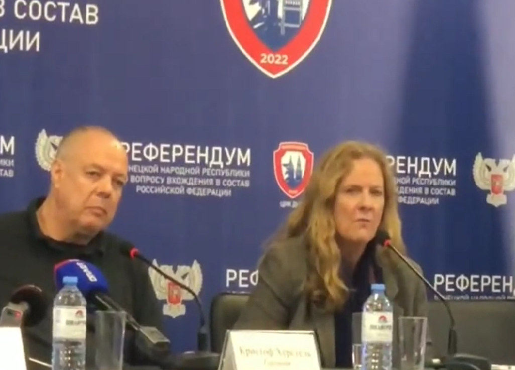 "International observer" Beeley (right) at the news conference