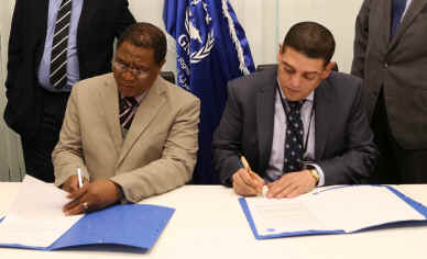 Loai Deeb (right) signs a memorandum of understanding with COMESA, the Common Market for Eastern and Southern Africa
