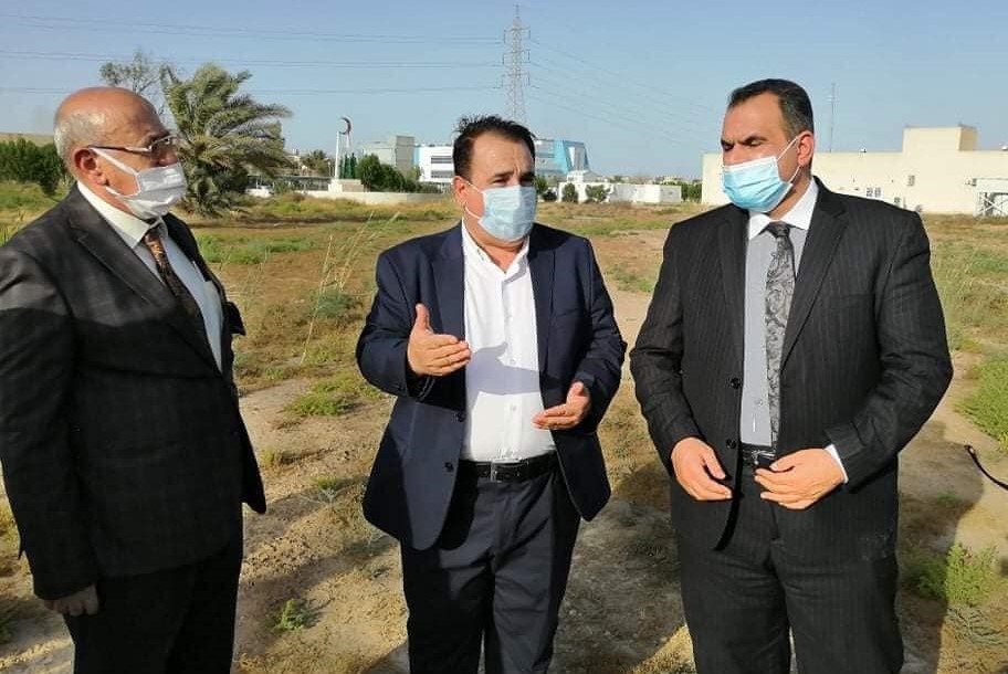 Iraqi officials inspect a field in Wasit which has been designated for construction of a specialised coronavirus hospital within a month