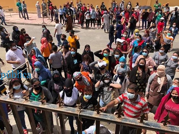 Undocumented migrant workers seeking to return home gather outside the Nepal embassy in Kuwait. Photo: Hari Neupane via MyRepublica