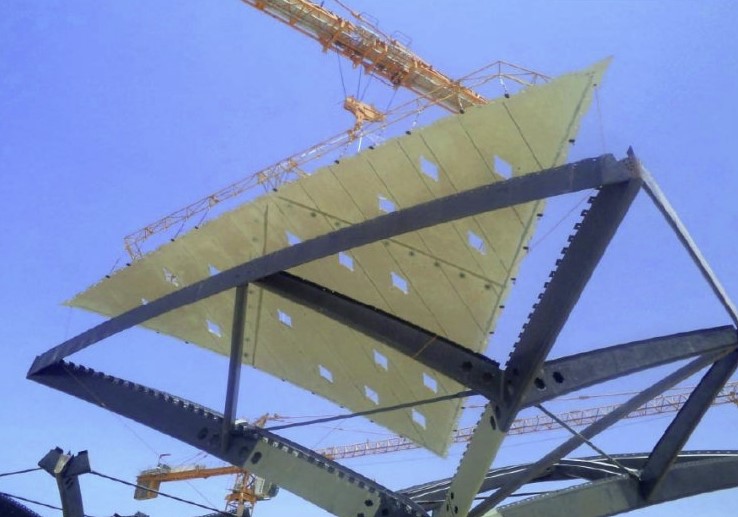 Manoeuvring one of the original composite roof panels into position at Jeddah station